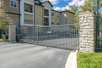 A gated entrance to a residential building.